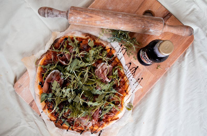 Prosciutto e Rucola pizza with arugula and prosciutto at Pizzana